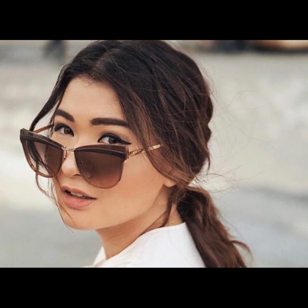 Prada SPR 12U sunglasses. Made in Italy